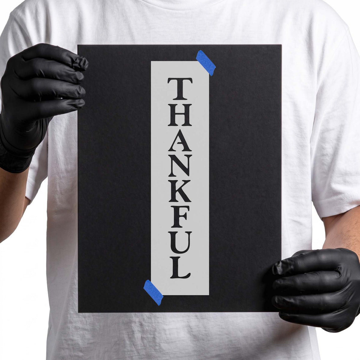 Thankful stencil with vertically stacked serif letters