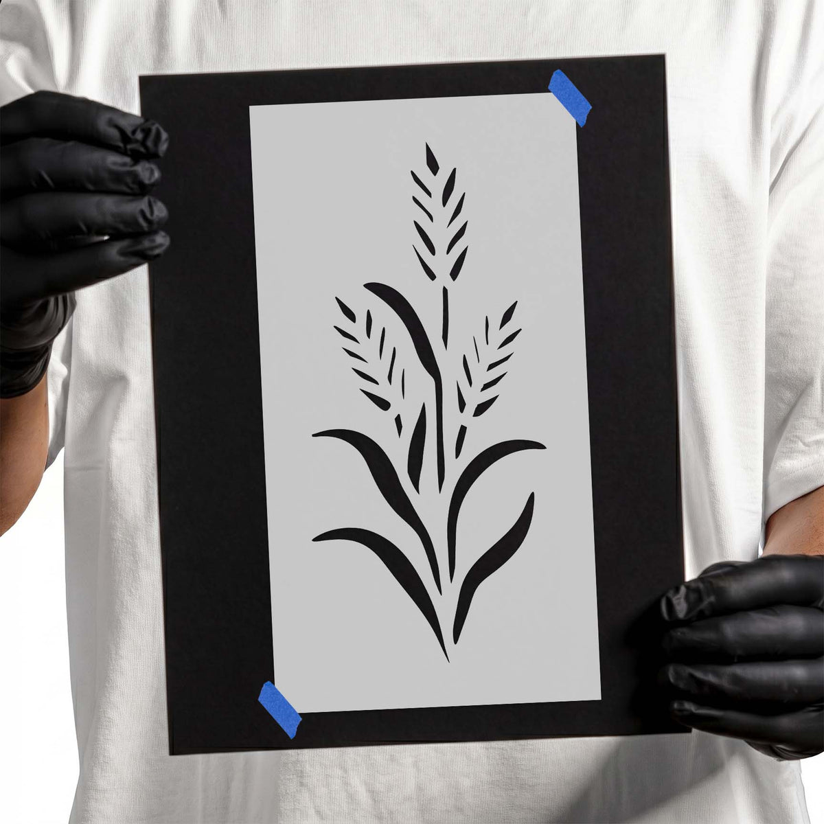 Wheat stencil with three grain heads and sweeping leaves
