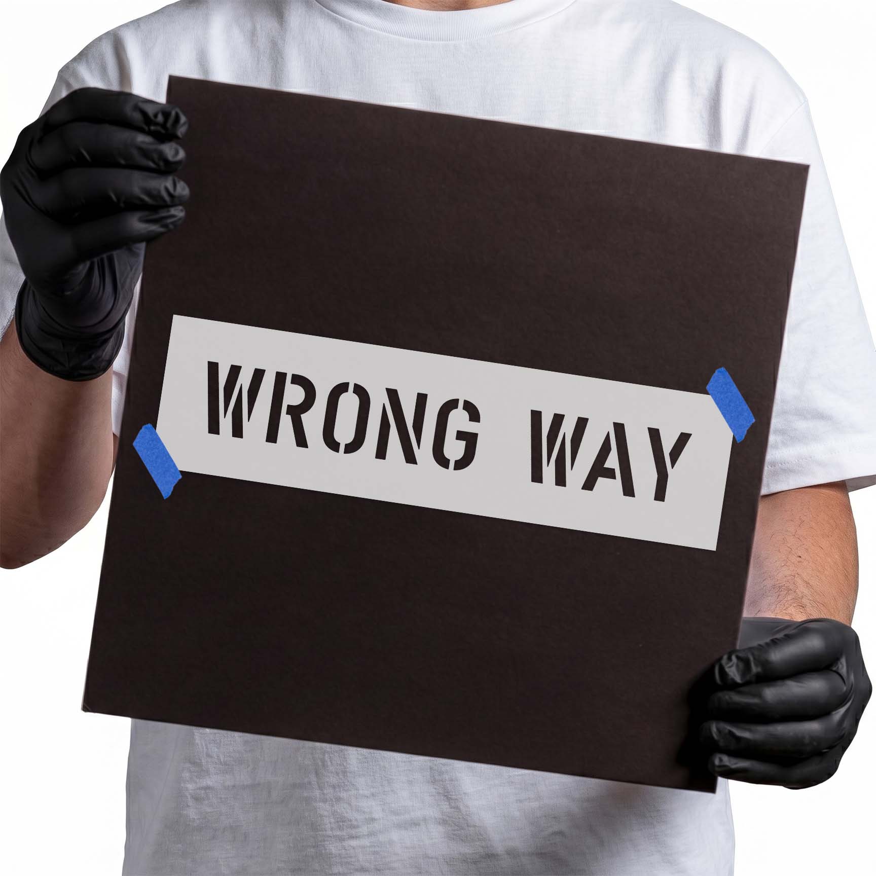 Wrong way stencil with tall uppercase directional lettering