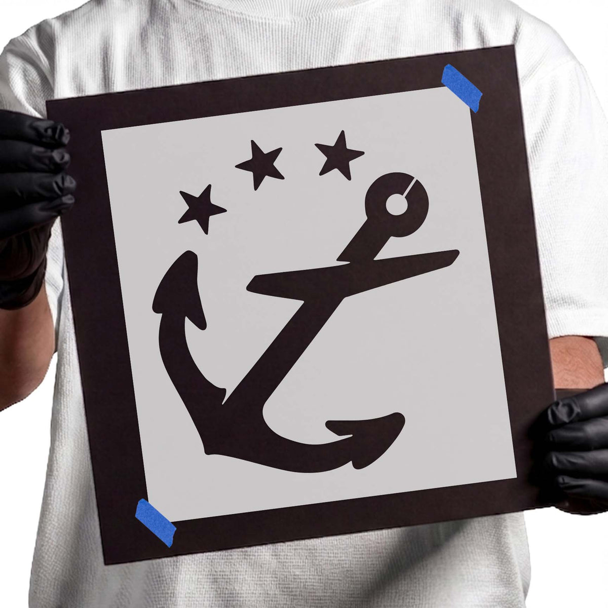 Anchor stencil with three five-point stars above nautical design