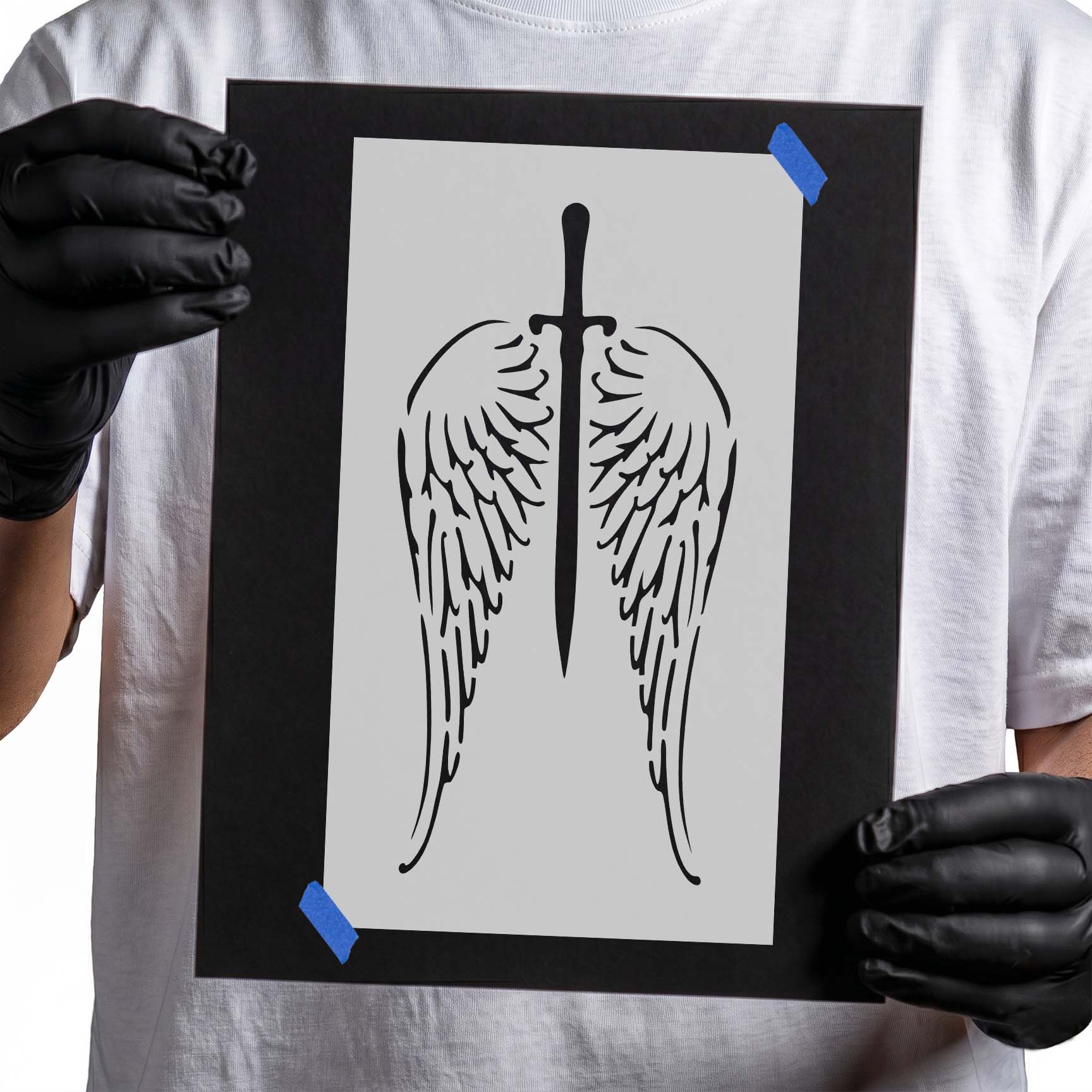 Feathered angel wings stencil surrounding a centered vertical sword