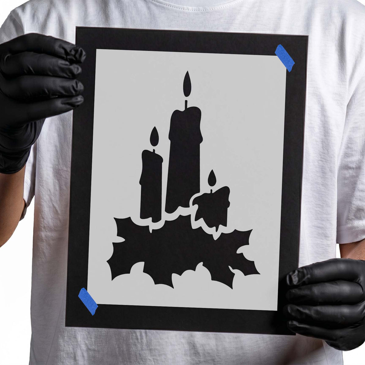 Christmas candle stencil with three flames and pointed holiday leaves