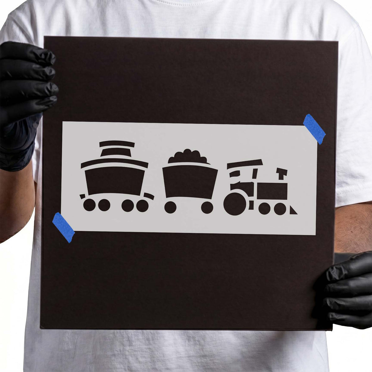 Cartoon train stencil with locomotive and two connected cars