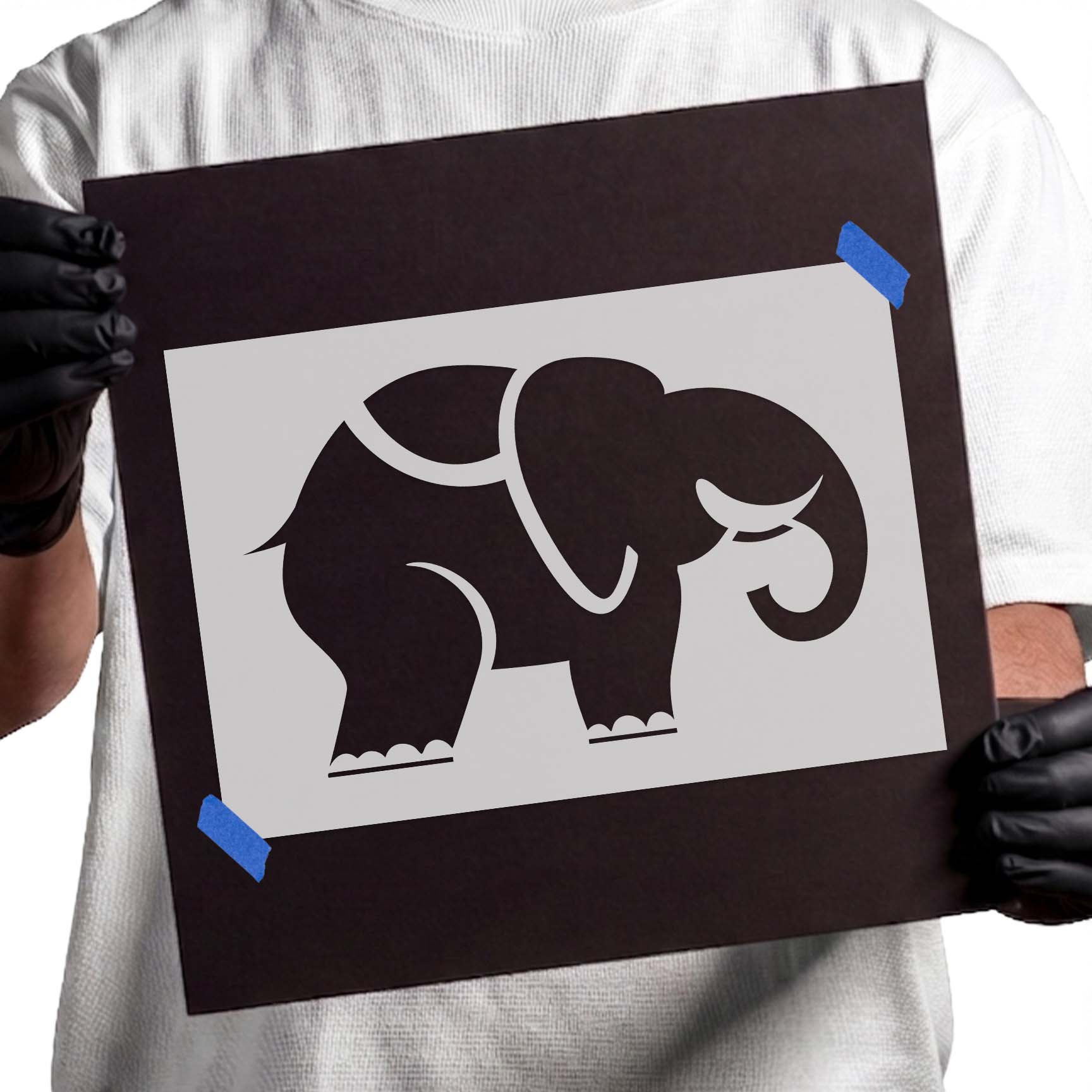 Circus elephant stencil with curled trunk, large ear, and decorative covering