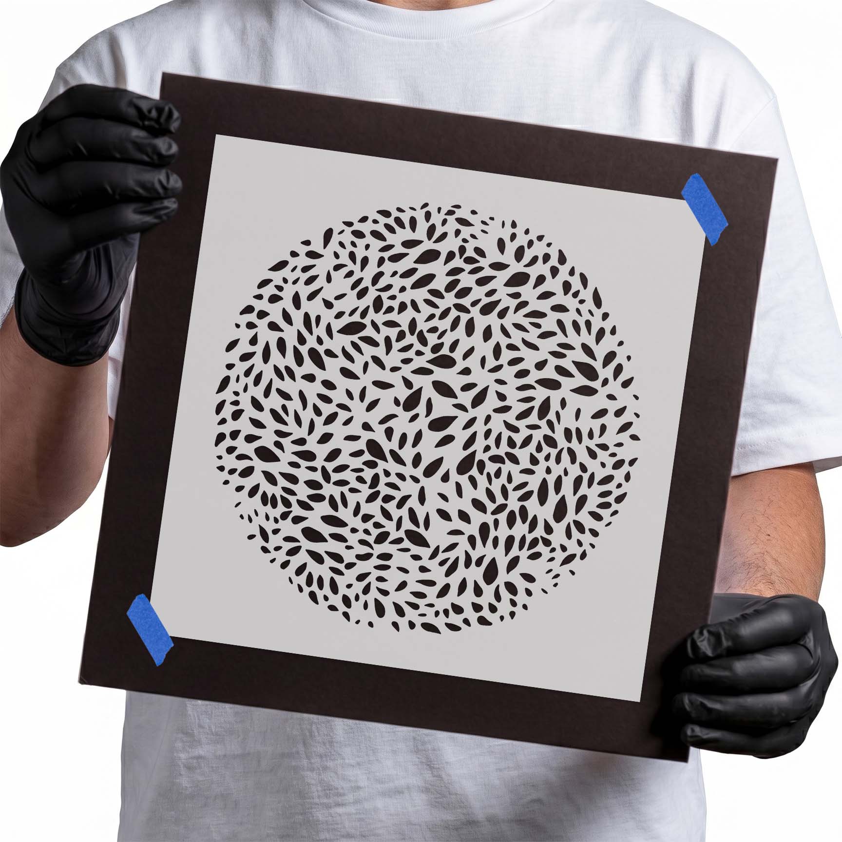 Circular leaf pattern stencil with dense layered botanical shapes