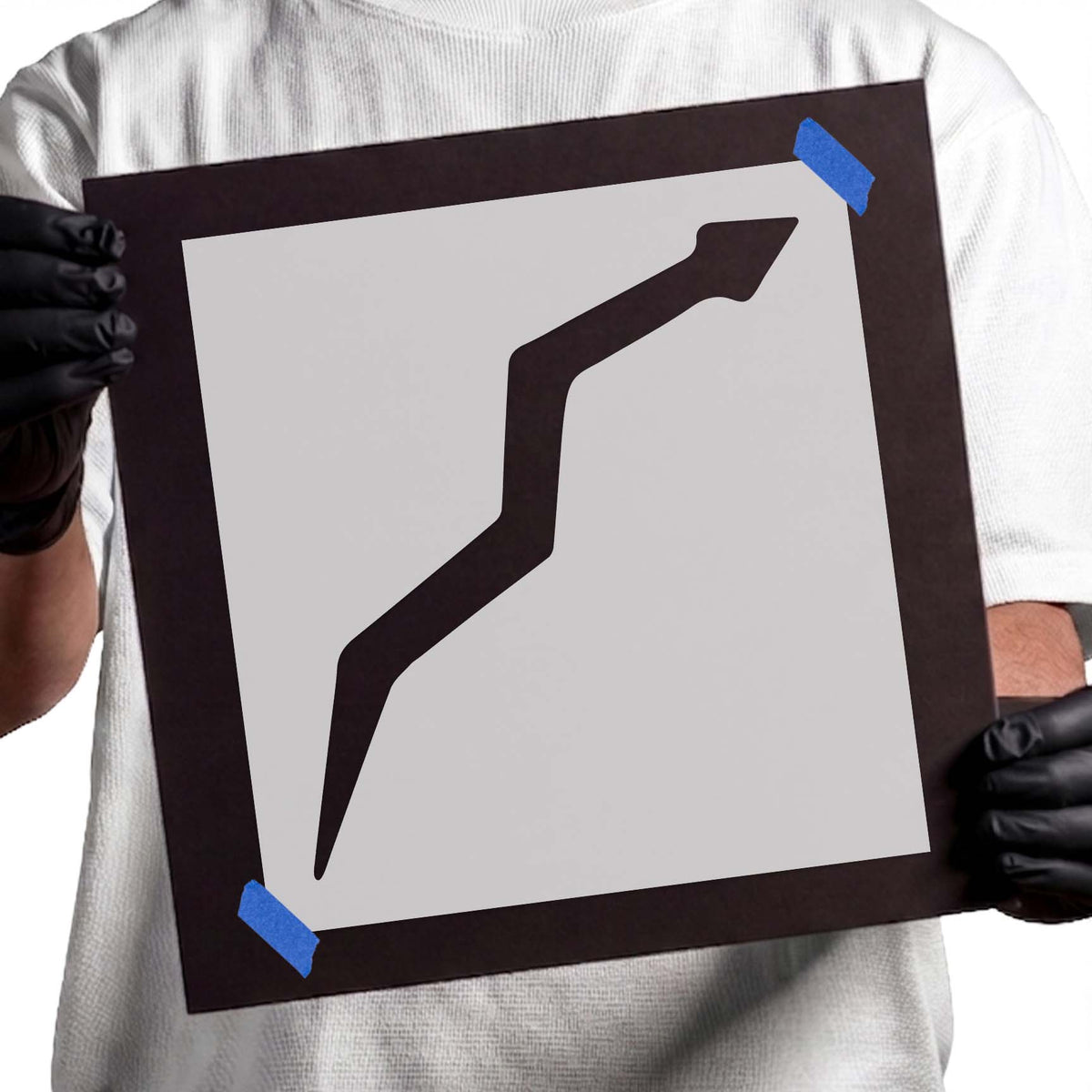 Angular desert snake stencil with a long winding reptile silhouette