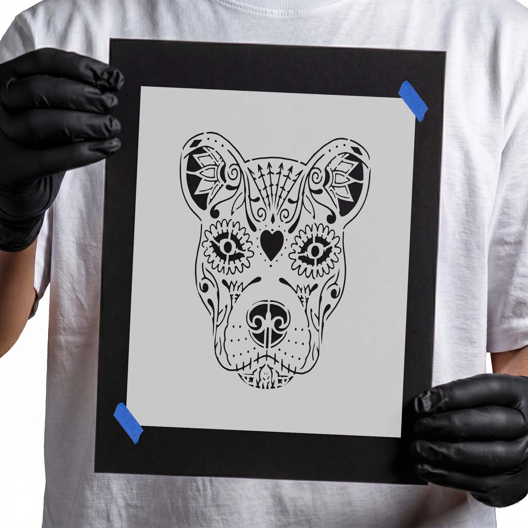 Ornamental pitbull face stencil with floral eyes and decorative swirls