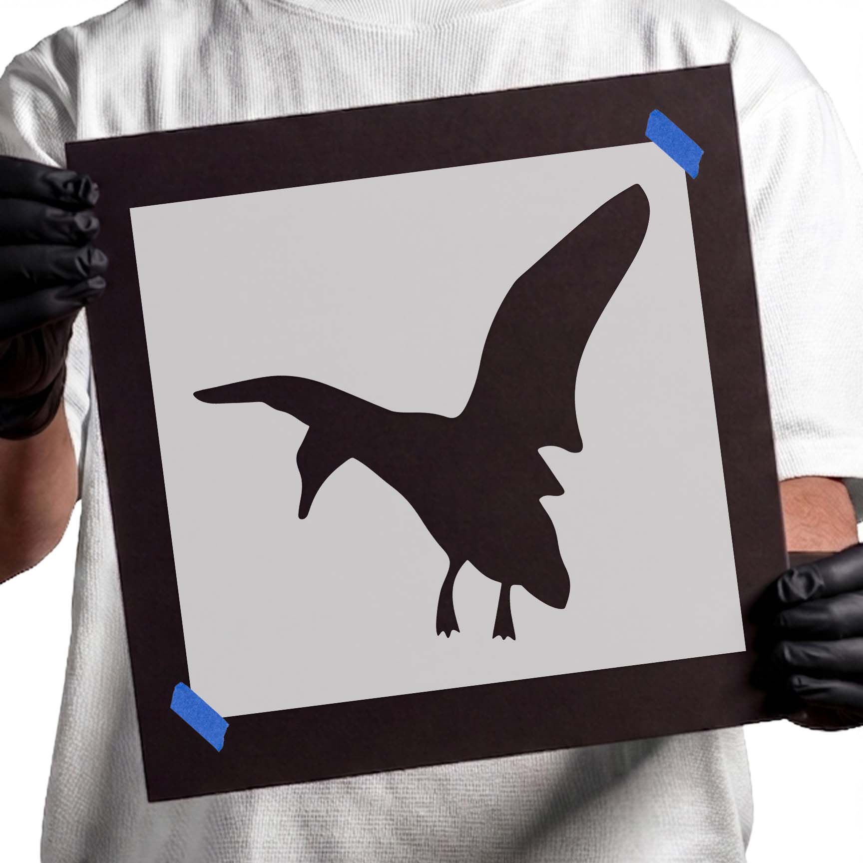 Flying duck stencil with angled wings and lowered head