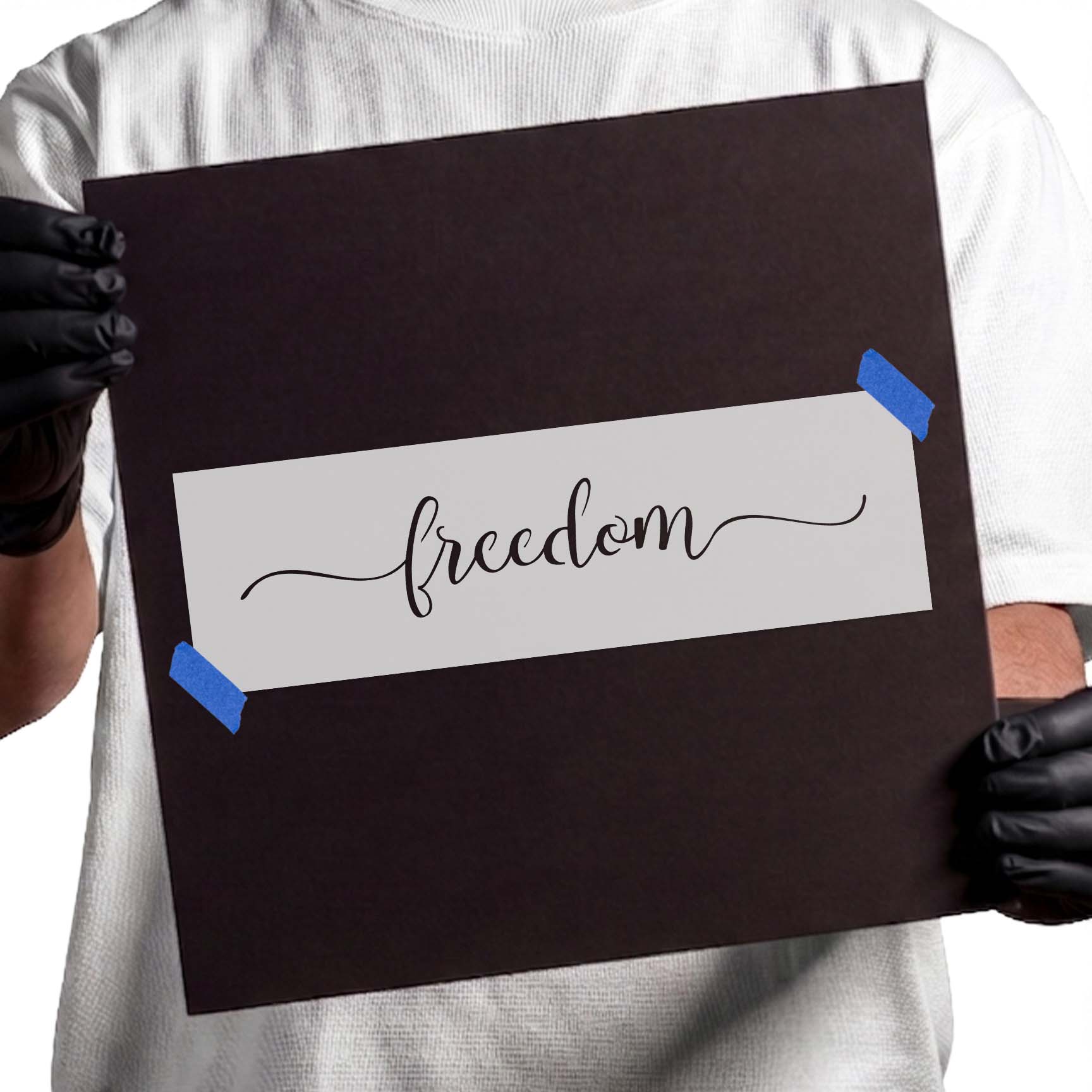 Freedom stencil with flowing cursive lettering and decorative flourishes