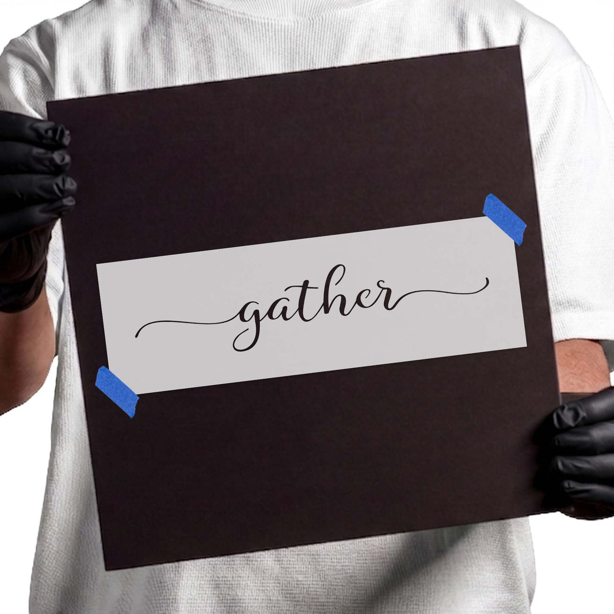 Cursive gather stencil lettering with sweeping decorative flourishes
