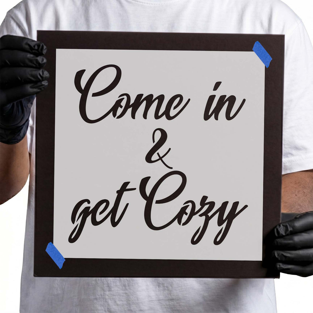 Get Cozy stencil featuring Come in lettering, decorative ampersand, and flowing cursive script