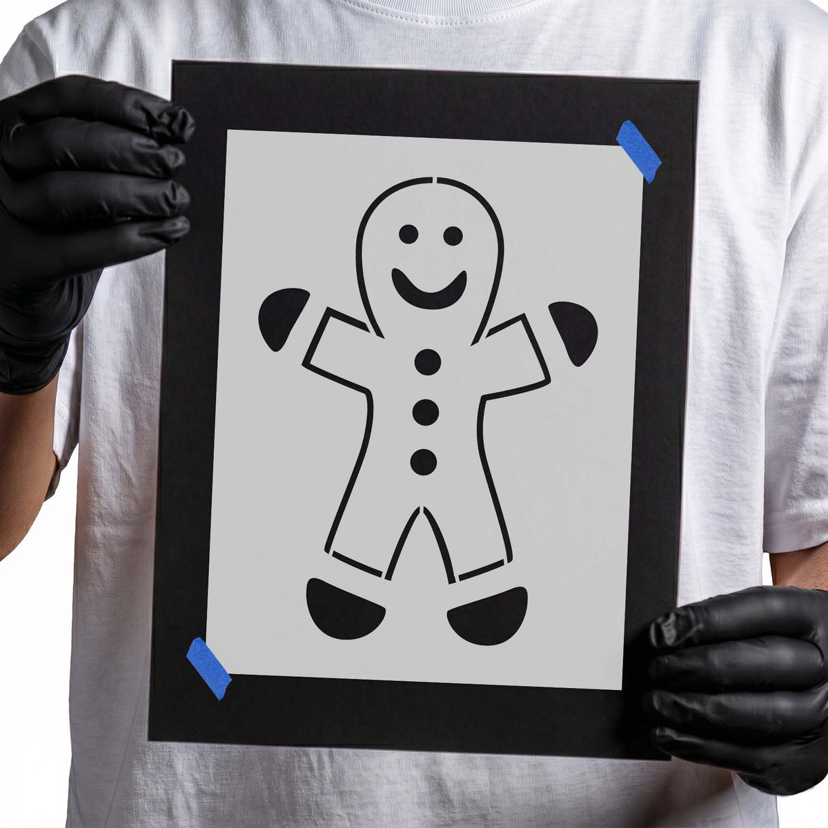Cheerful gingerbread man stencil with smiling face and round buttons