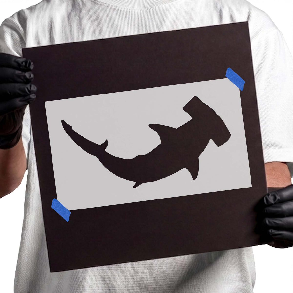 Hammerhead shark stencil with distinctive wide head and curved body