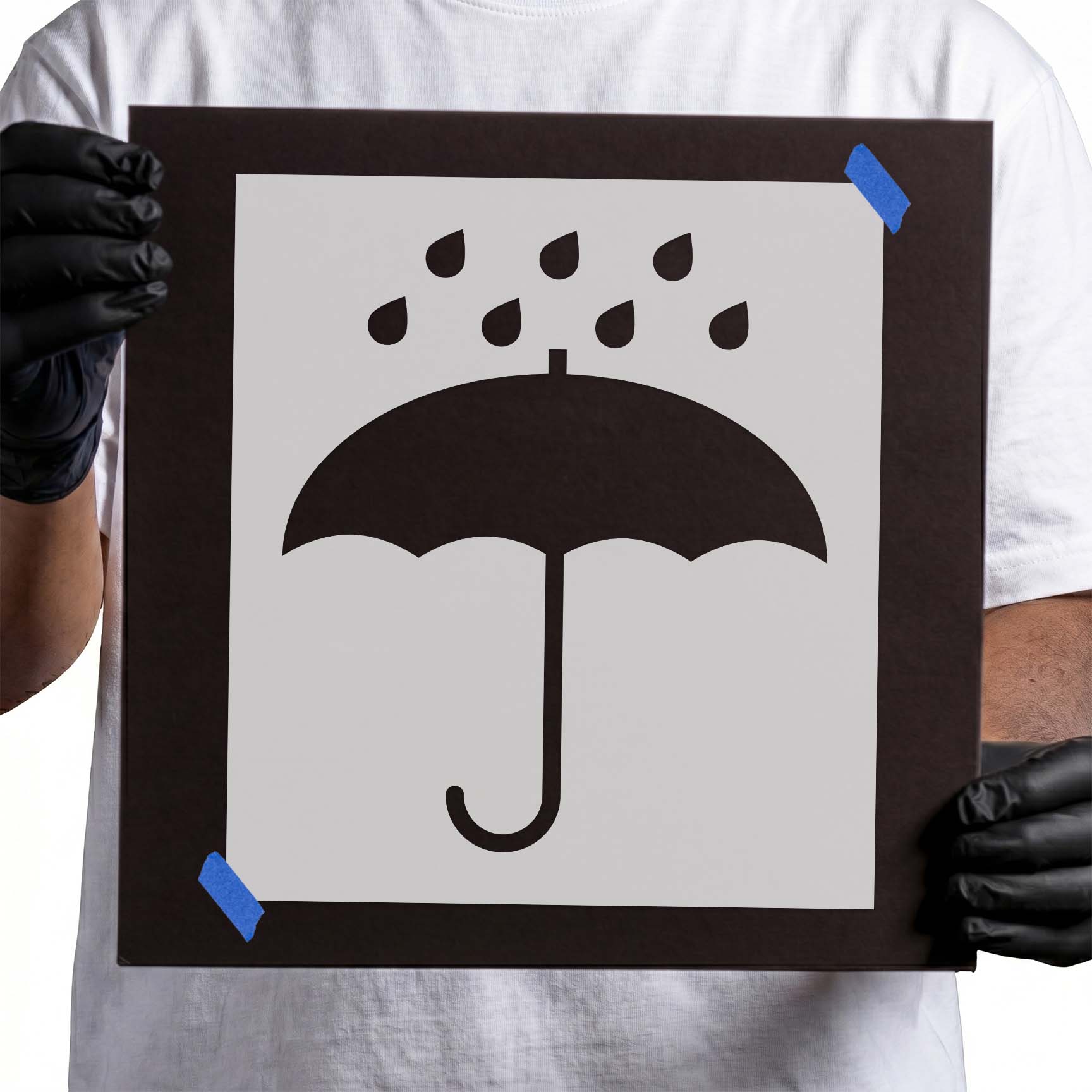 Keep dry stencil with umbrella silhouette and falling raindrops