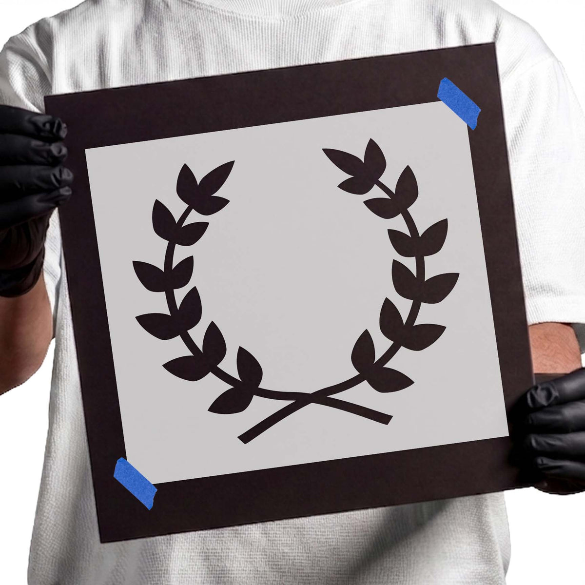 Laurel wreath stencil with symmetrical curved leafy branches