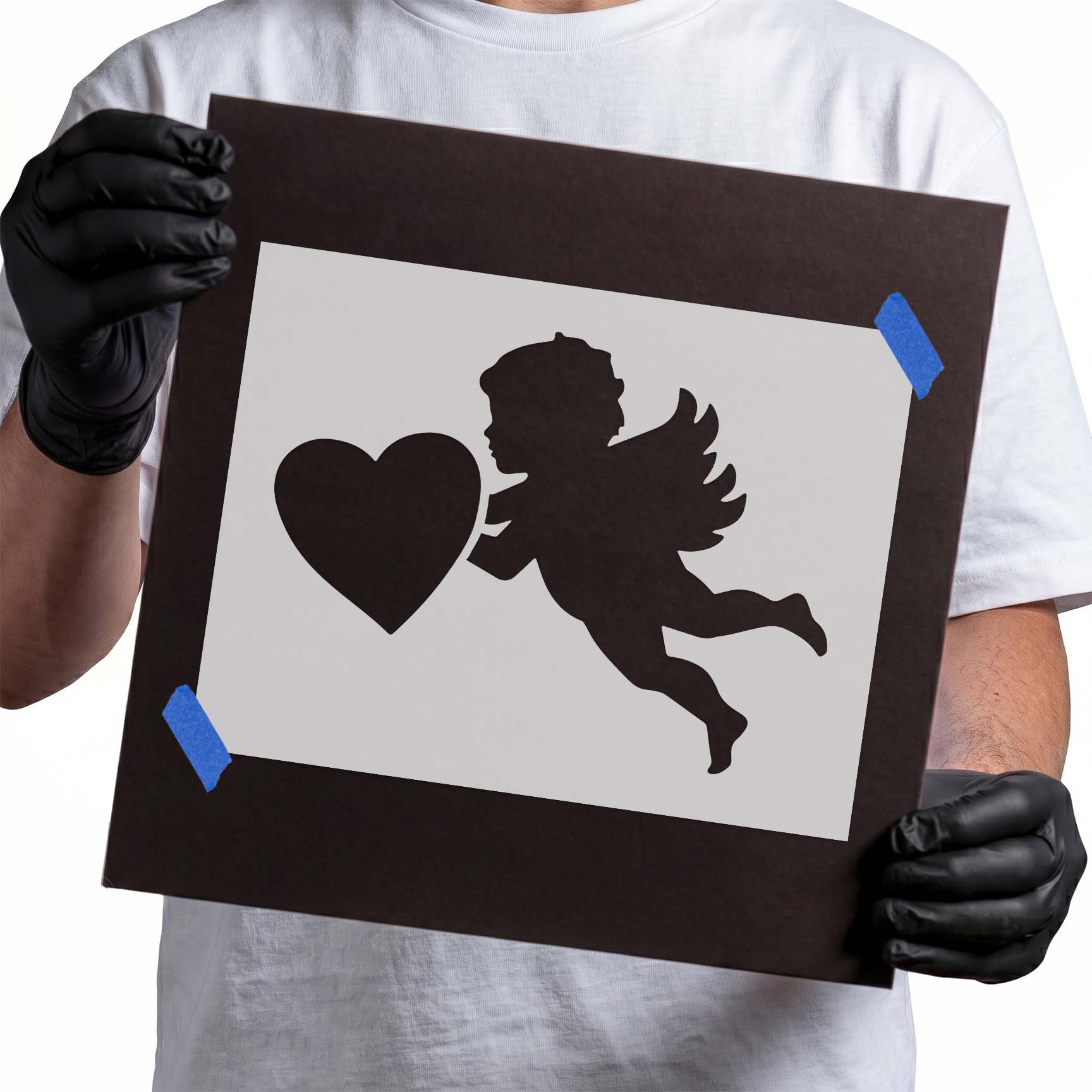 Cupid stencil with winged cherub silhouette beside a large heart