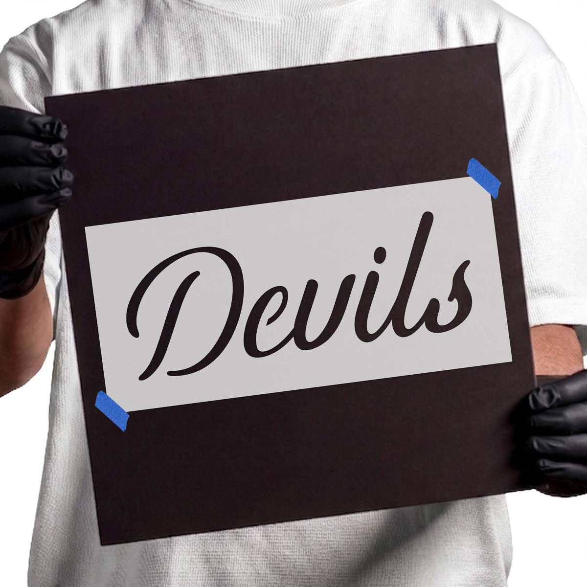 Devils mascot stencil with flowing cursive lettering