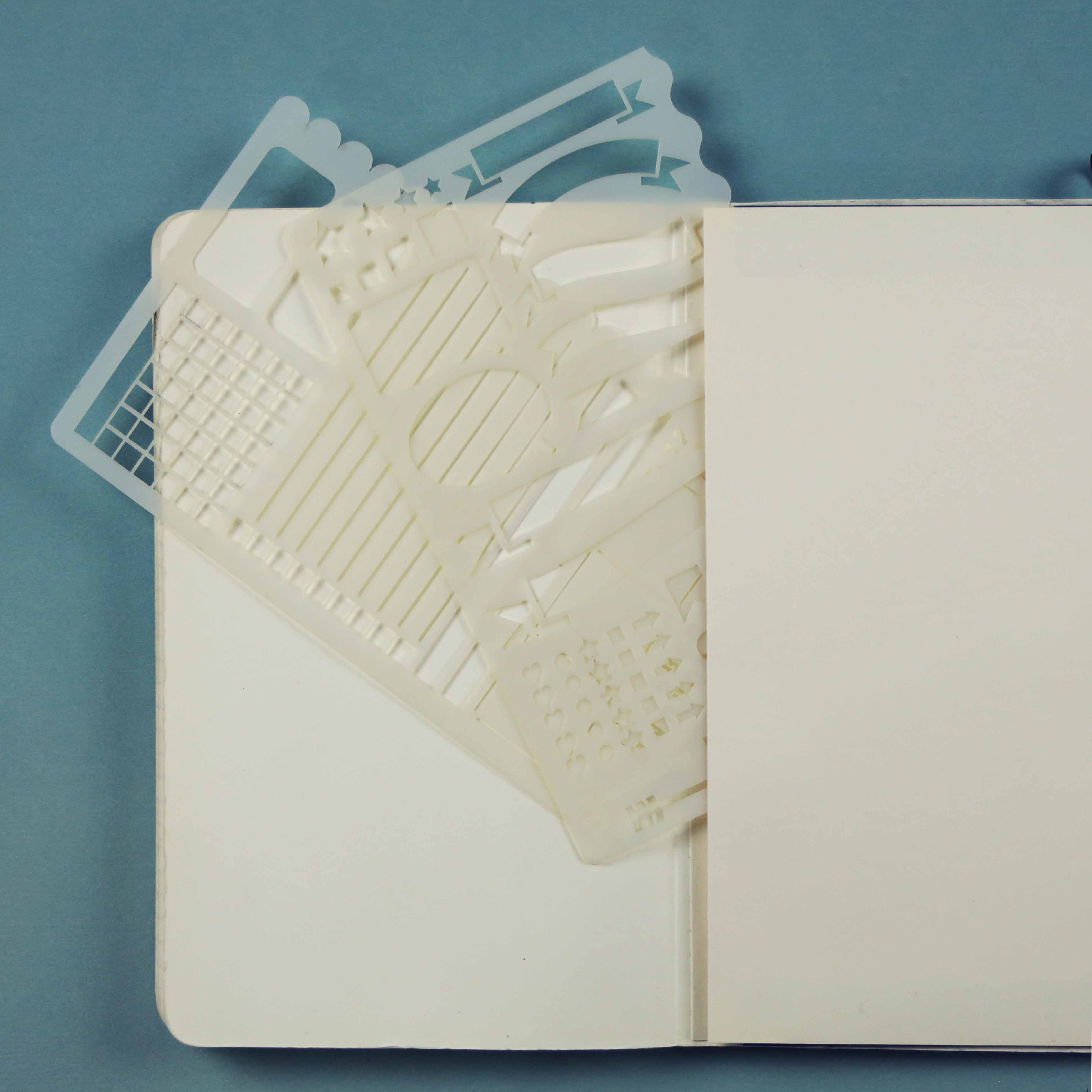 Bullet journal stencils in notebook sleeve
