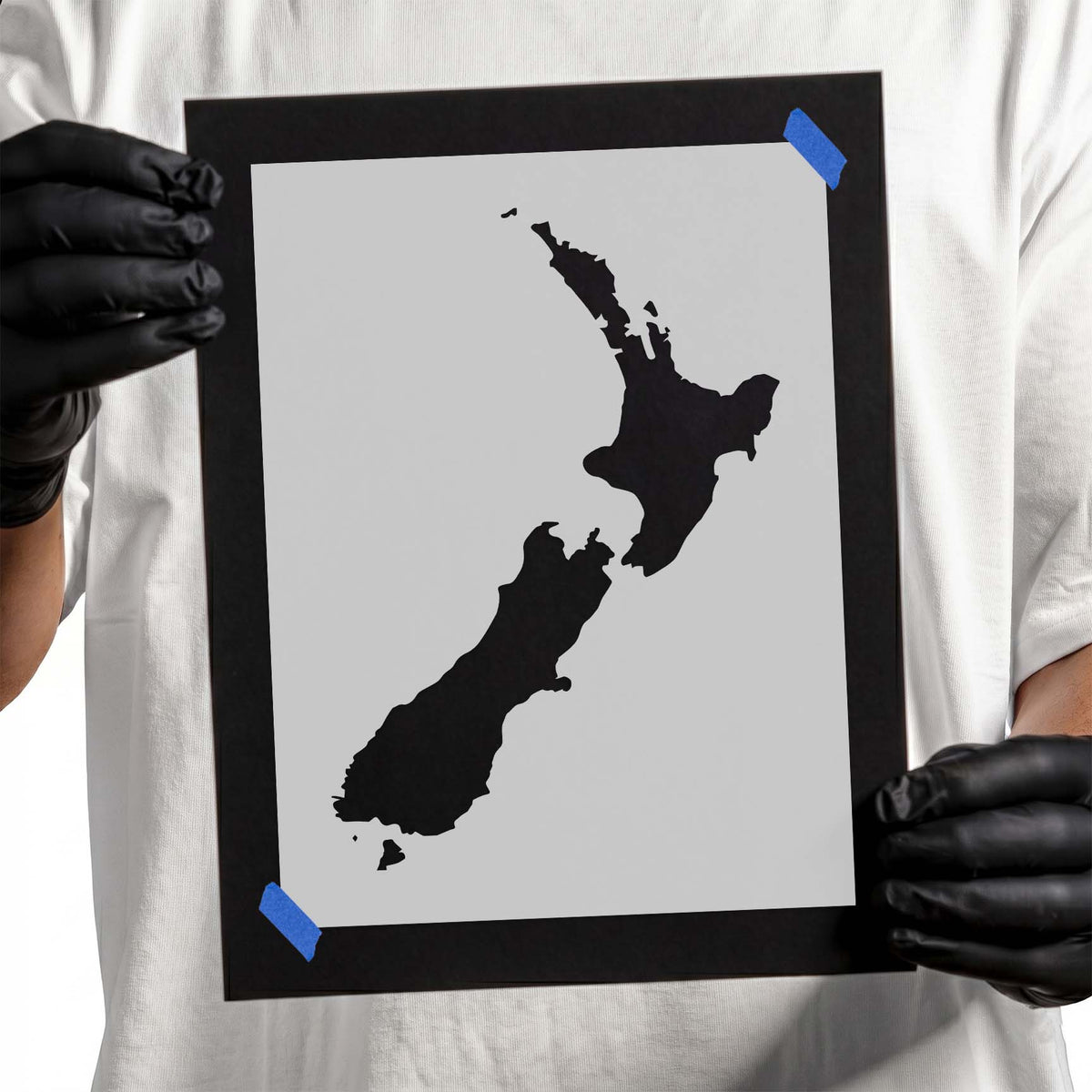 New Zealand map stencil featuring North and South Island silhouettes with detailed coastlines