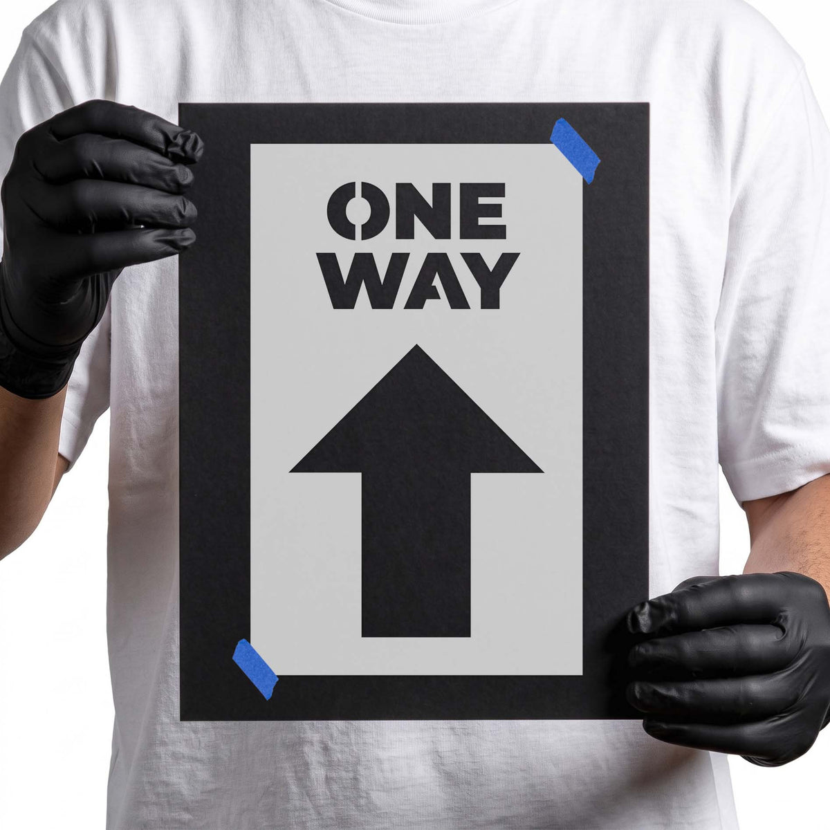One way stencil with bold lettering and upward directional arrow