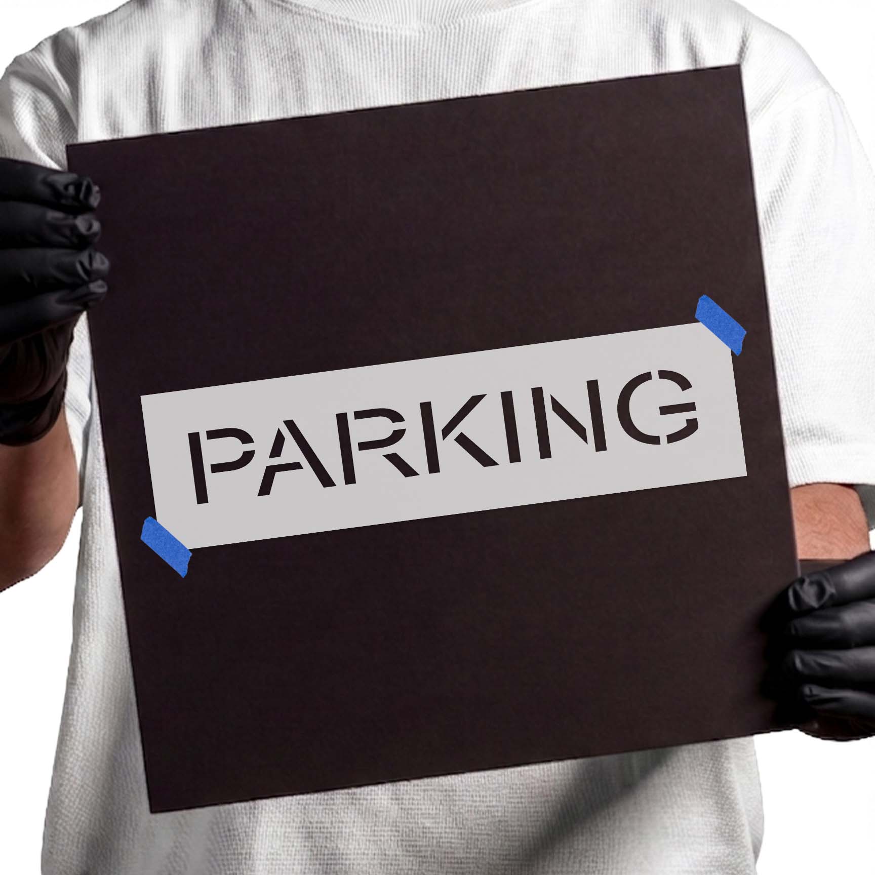 Parking stencil with strong uppercase geometric lettering
