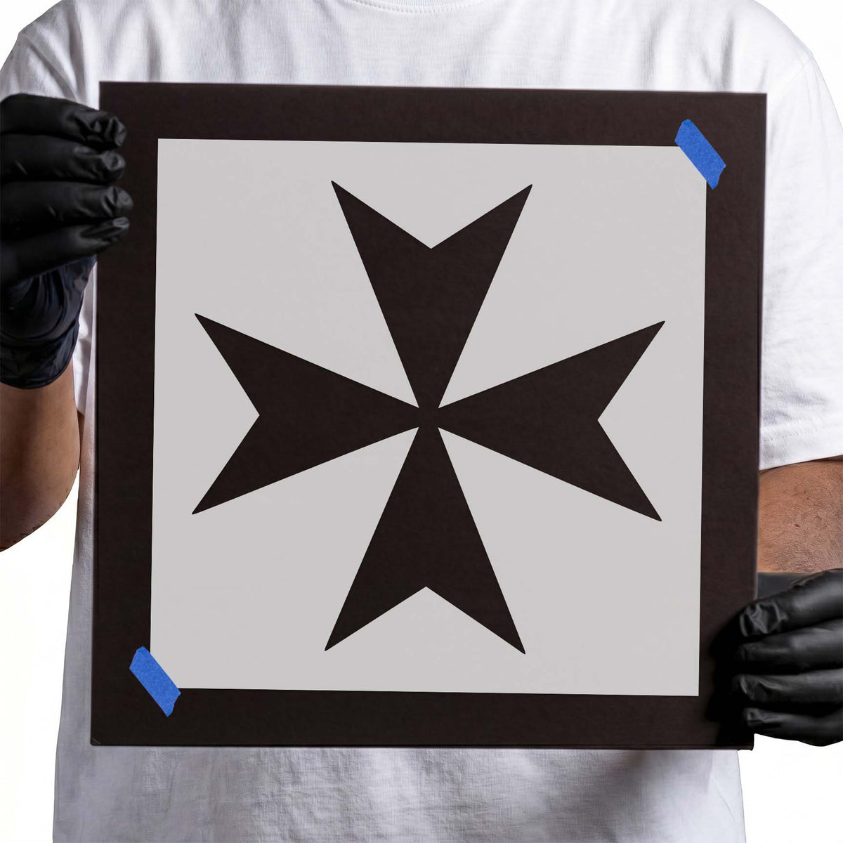 Pointed Maltese cross stencil with four symmetrical V-shaped arms
