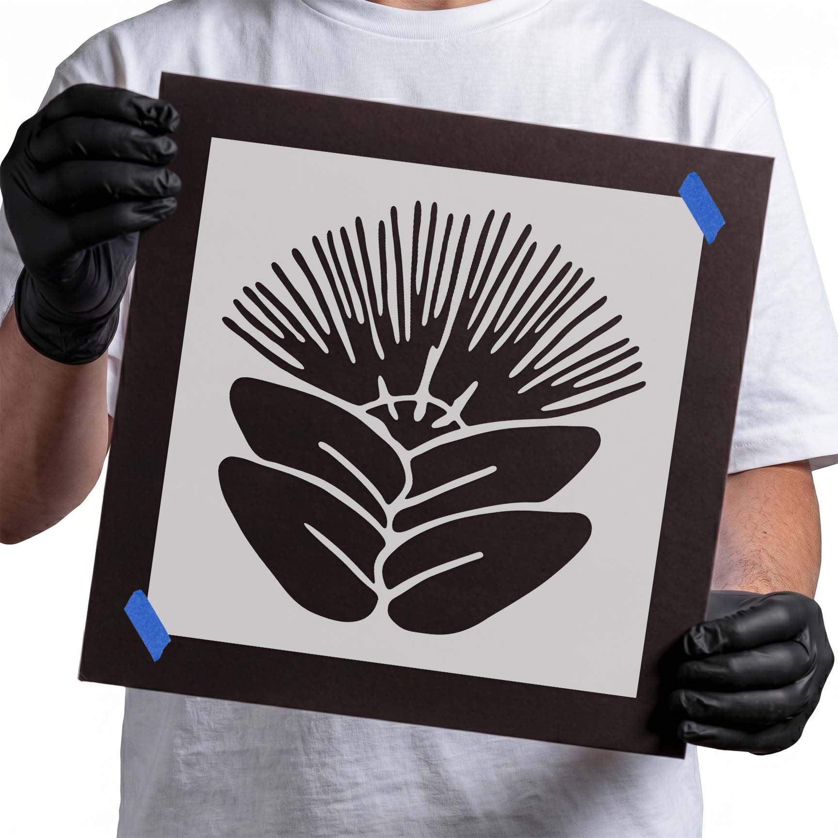 Powderpuff flower stencil with radiating petals and broad leaves