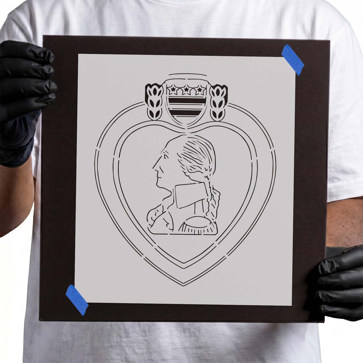 Purple Heart stencil with profile portrait, striped shield and stars