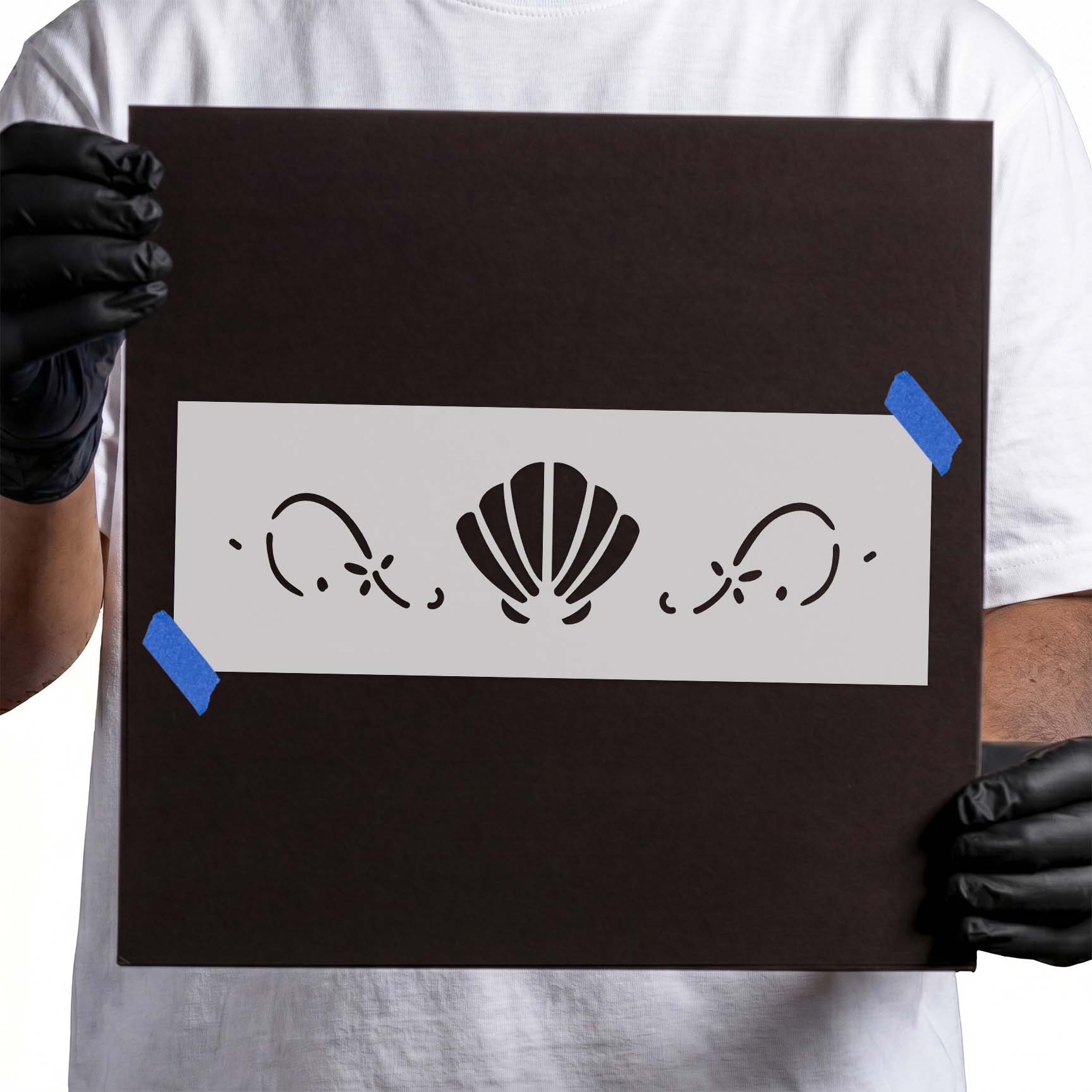 Seashell stencil with scallop shell and mirrored decorative curls