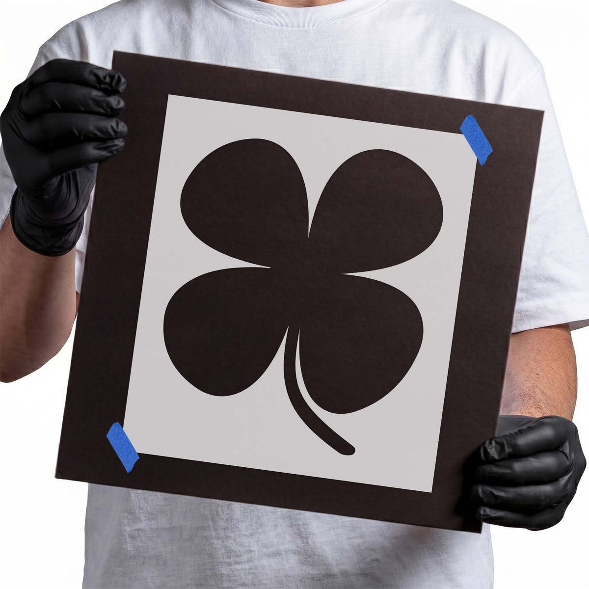 Rounded four leaf clover stencil with long curved stem