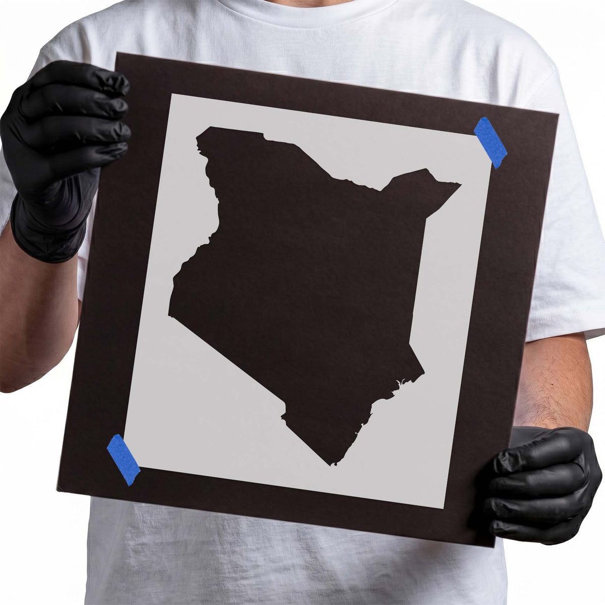 Stencil depicting the solid geographic silhouette of Kenya