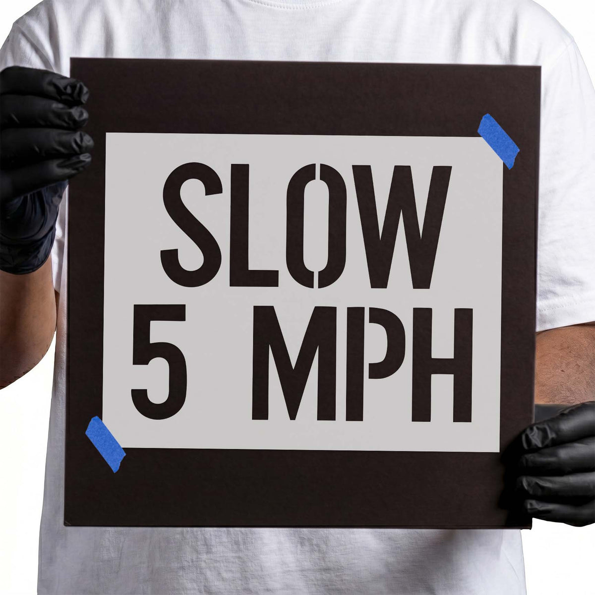 Slow 5 MPH stencil with large bold traffic lettering