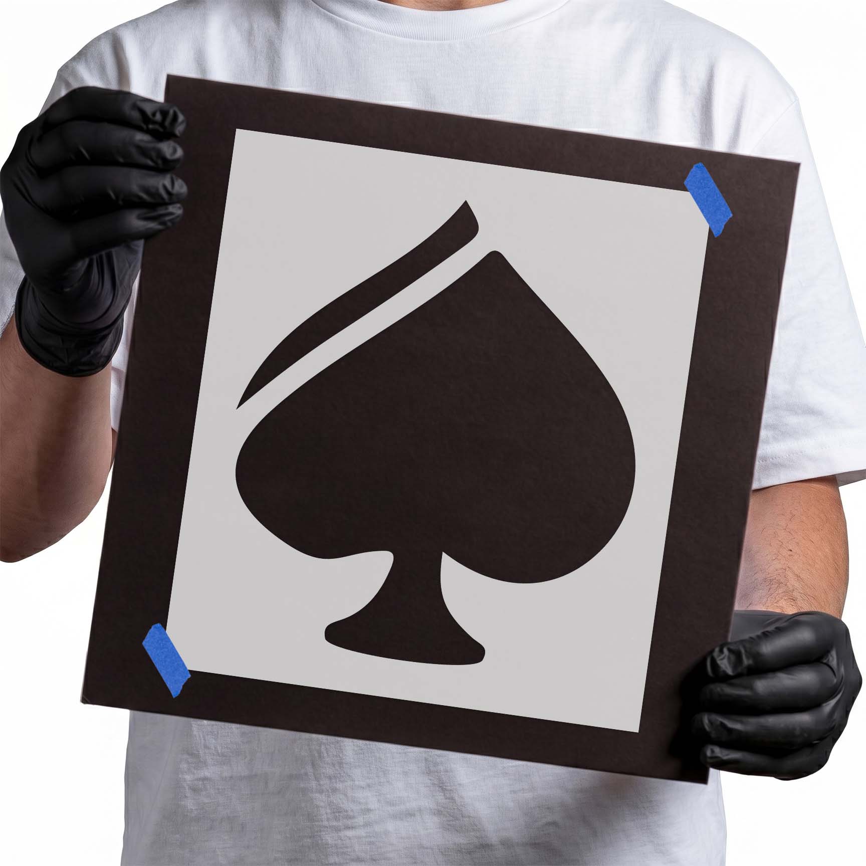 Spade stencil with bold playing card symbol and sweeping curved accent