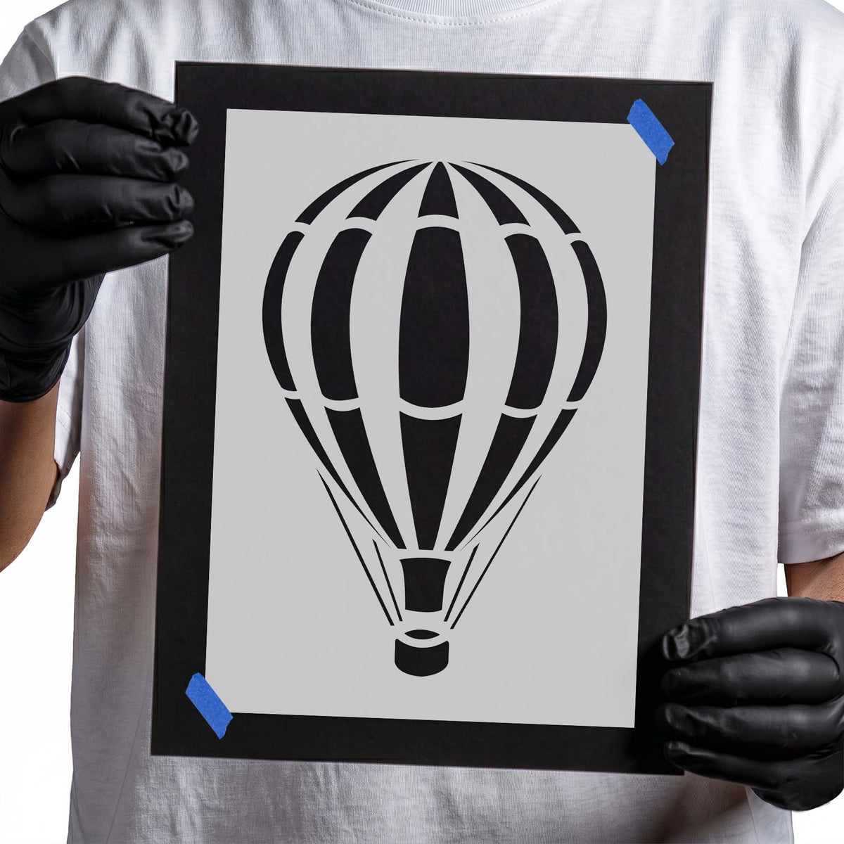 Classic hot air balloon stencil with bold striped canopy and basket