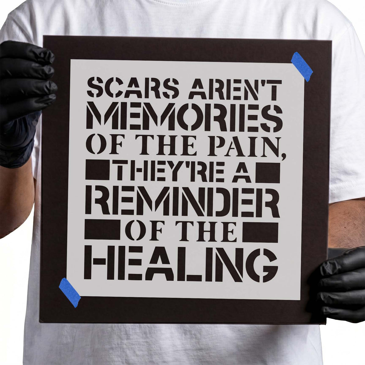 Scars and healing quote stencil in bold mixed typography