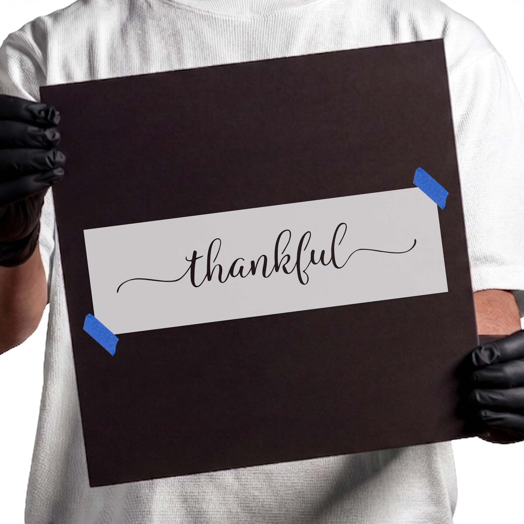Thankful stencil with flowing cursive lettering and decorative flourishes