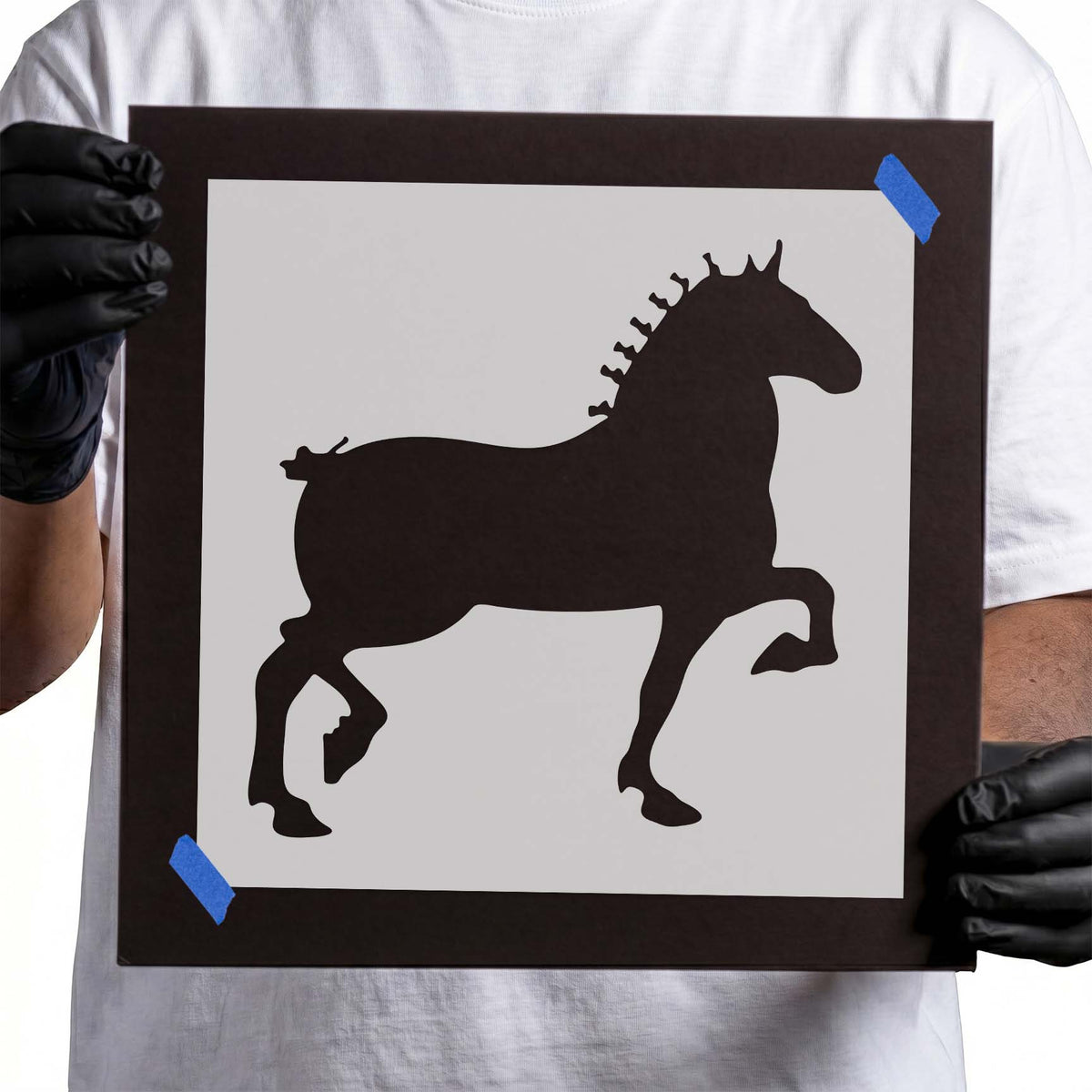 Trotting horse stencil with raised front leg and defined mane