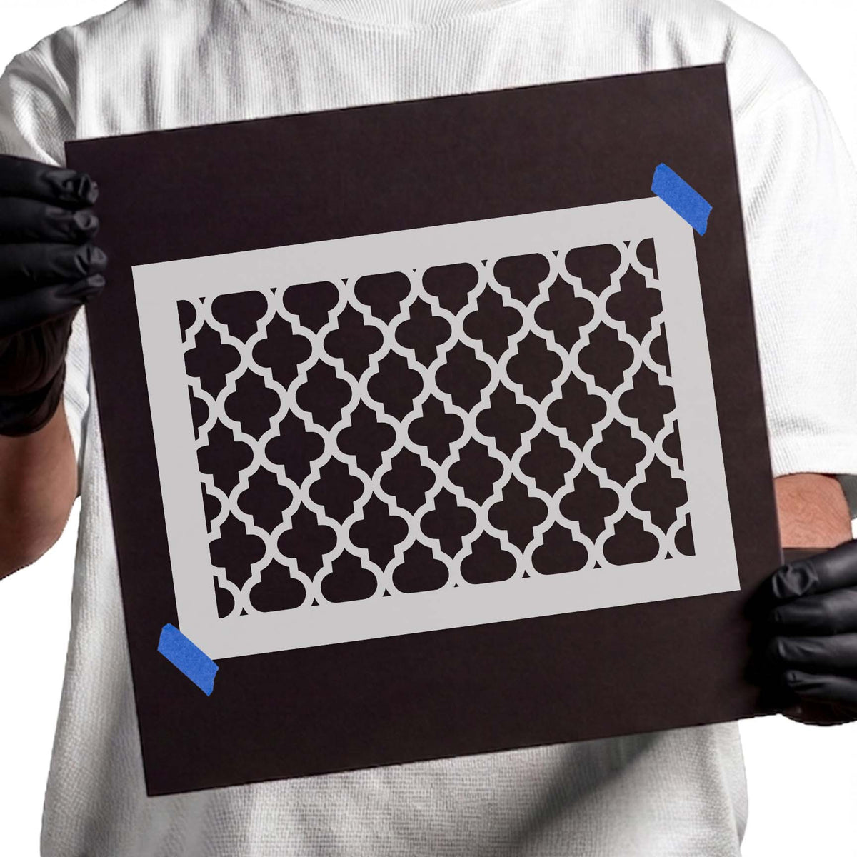 Repeating geometric tile pattern stencil with interlocking shapes