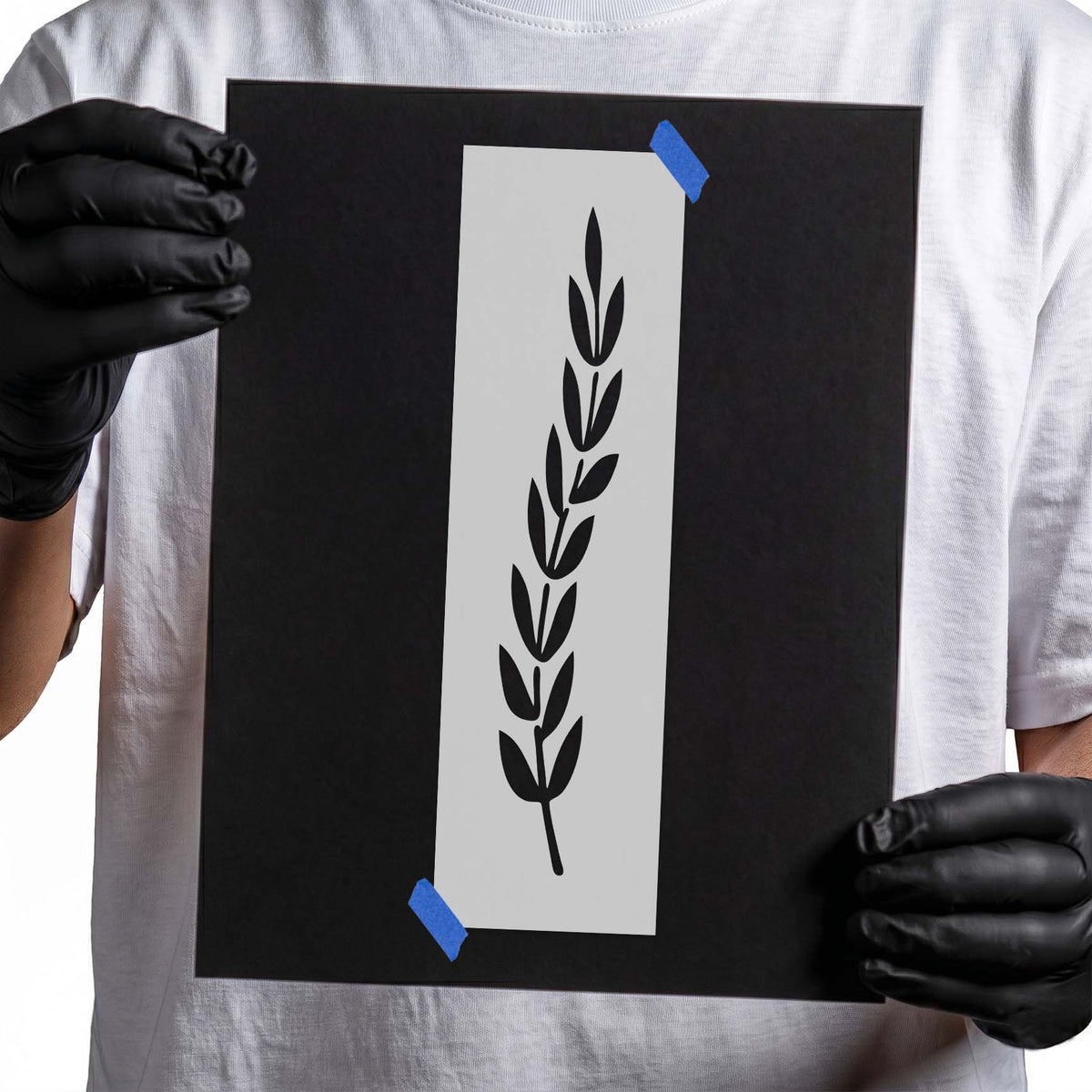 Wheat stalk stencil with slender stem and alternating pointed leaves