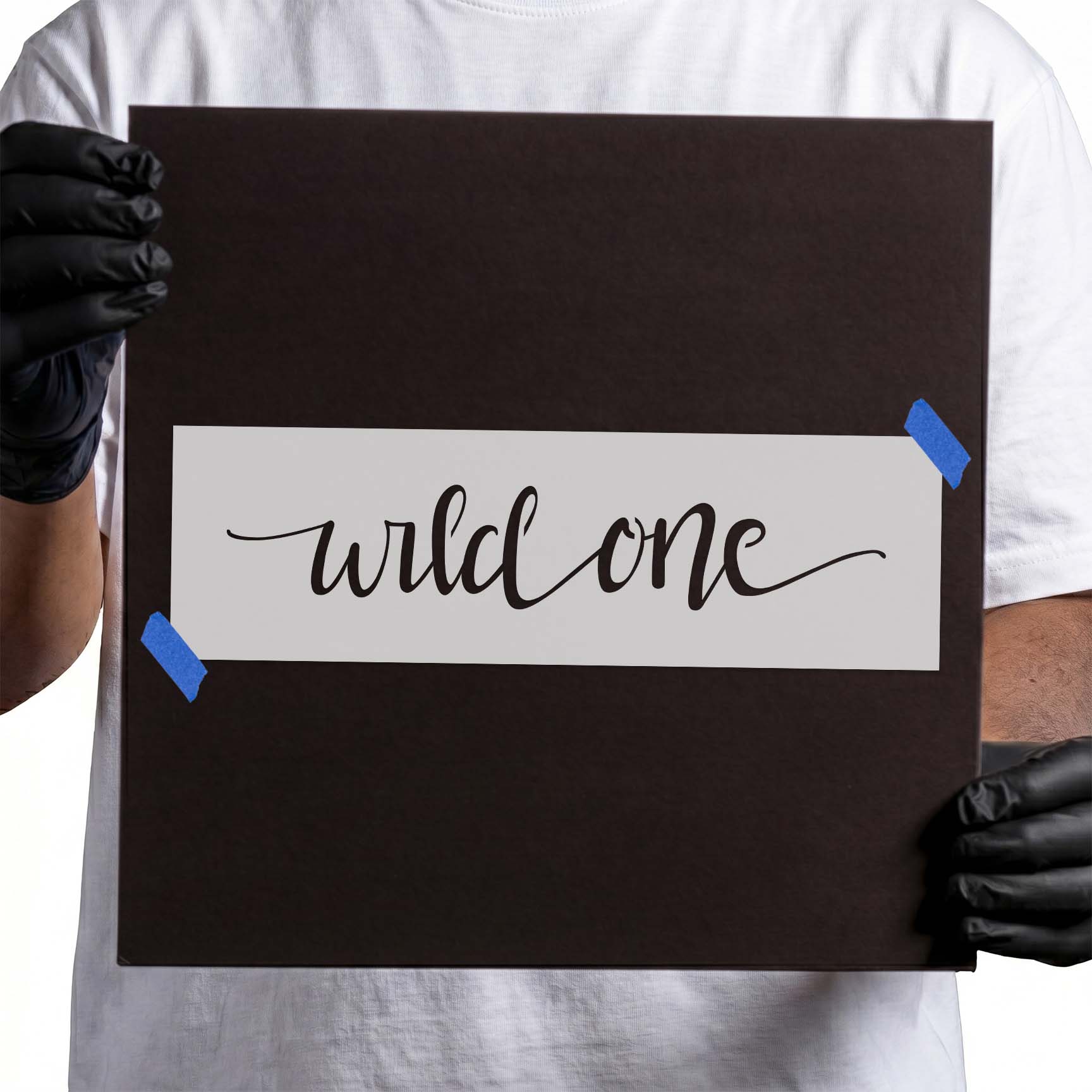 Wild One stencil with flowing cursive lettering and long flourishes