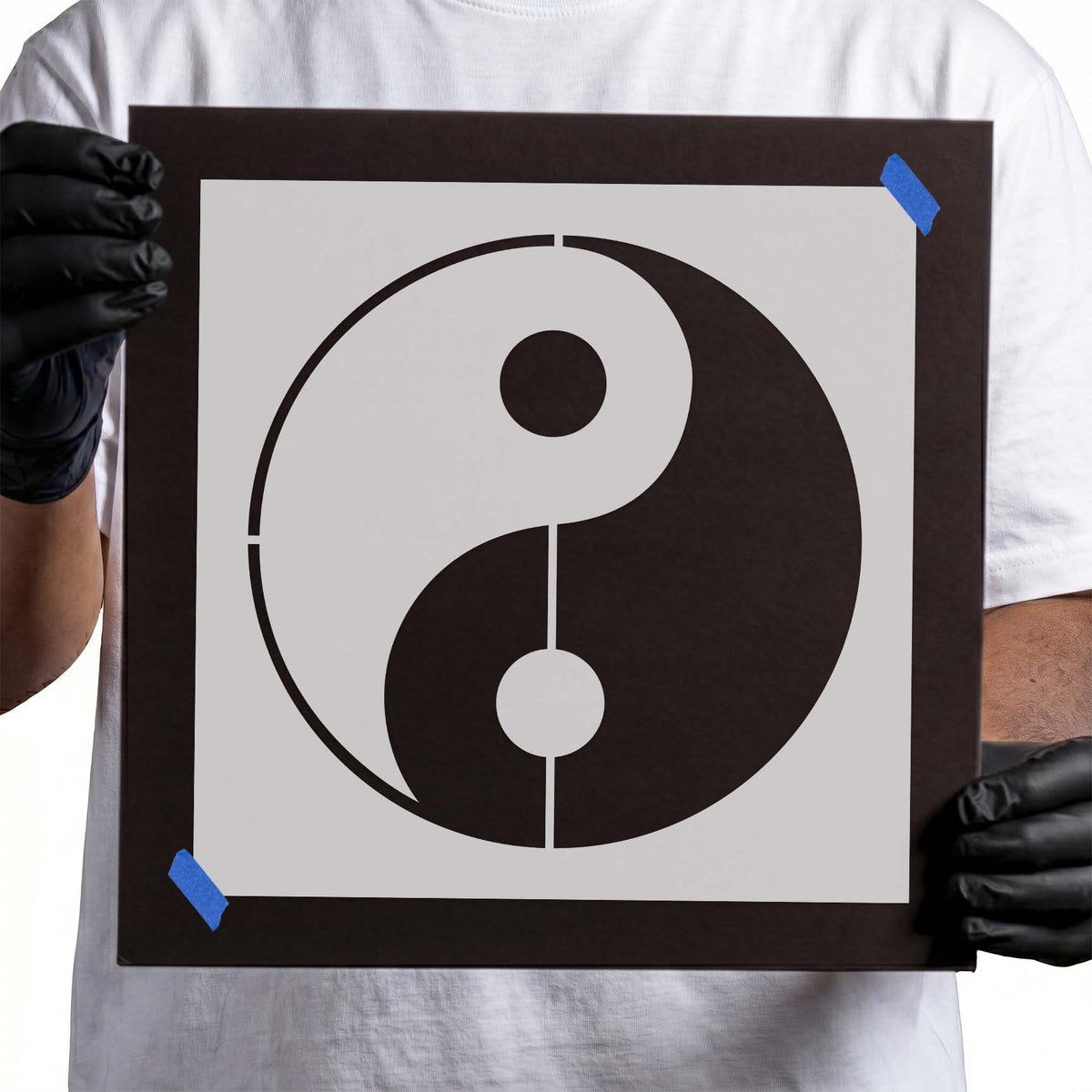Yin and yang stencil with curved halves and contrasting dots