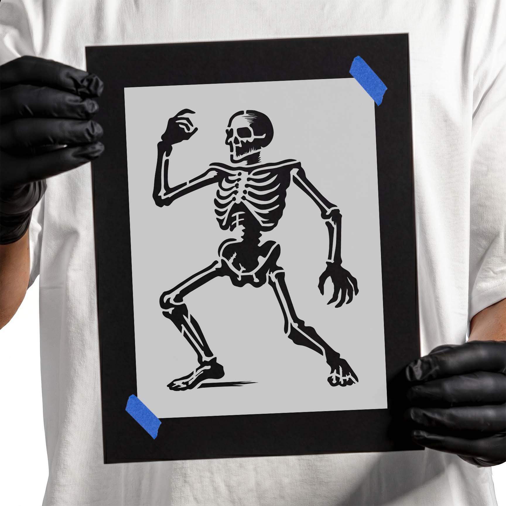 Dancing skeleton silhouette stencil with raised arms