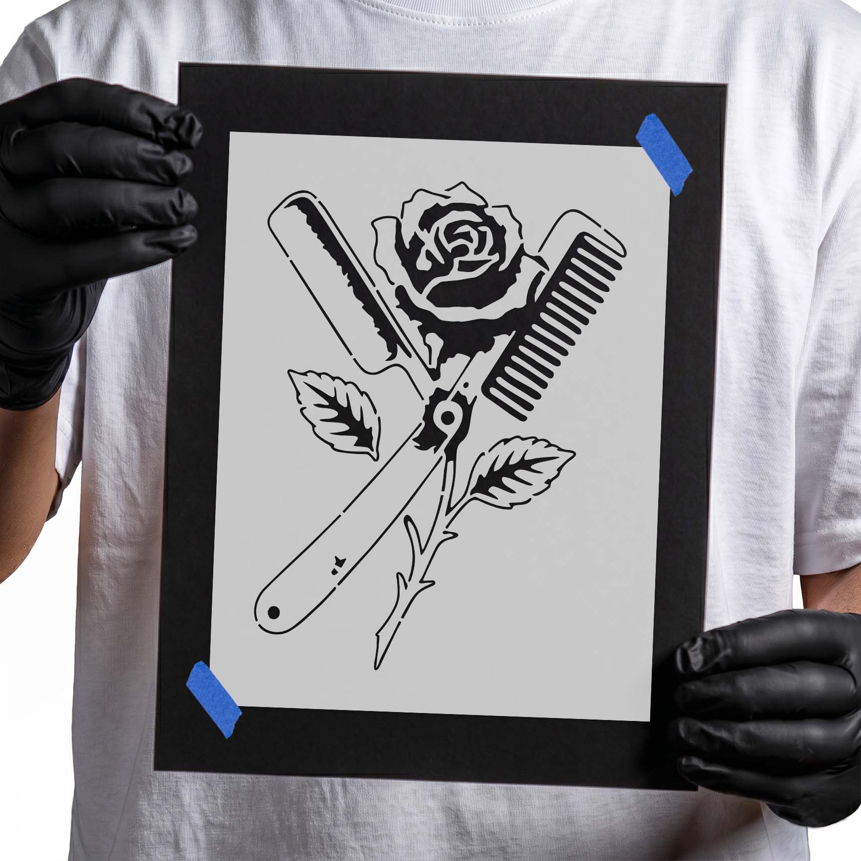 Crossed straight razor and barber comb with rose stencil design