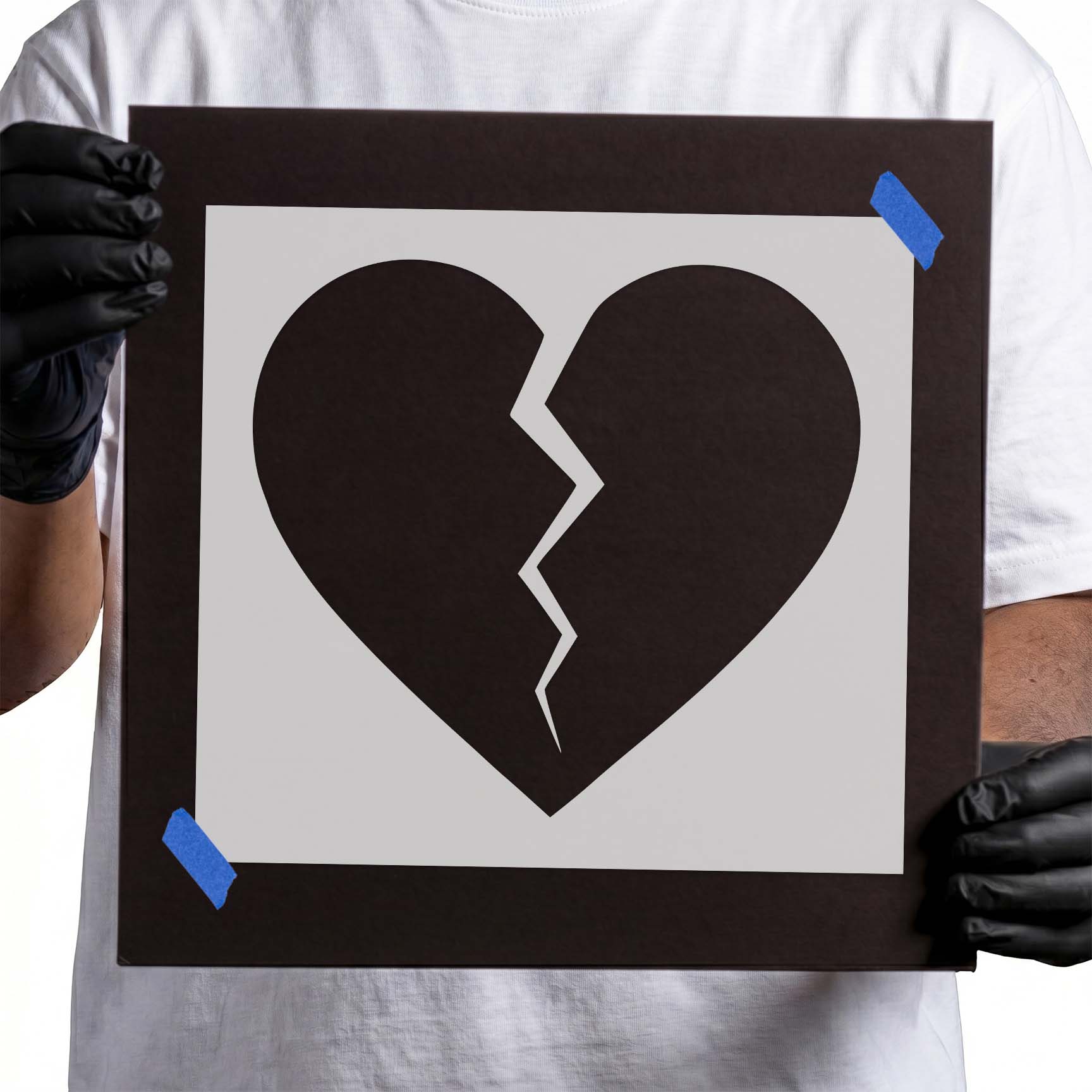 Broken heart stencil with bold jagged center crack
