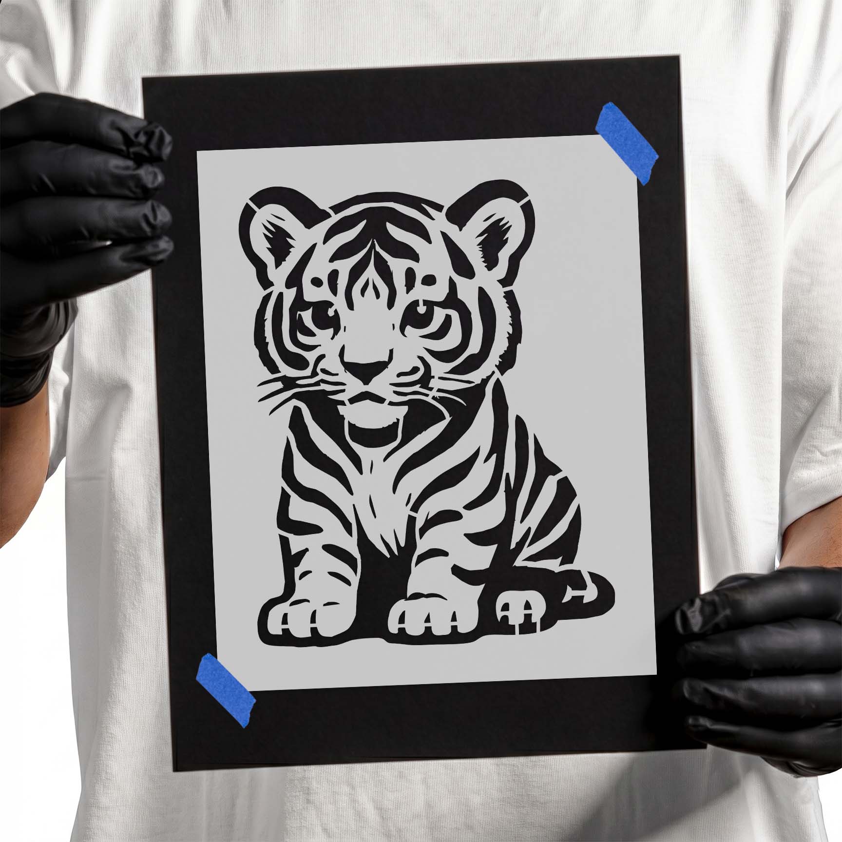Cute cartoon tiger cub reusable stencil with striped design
