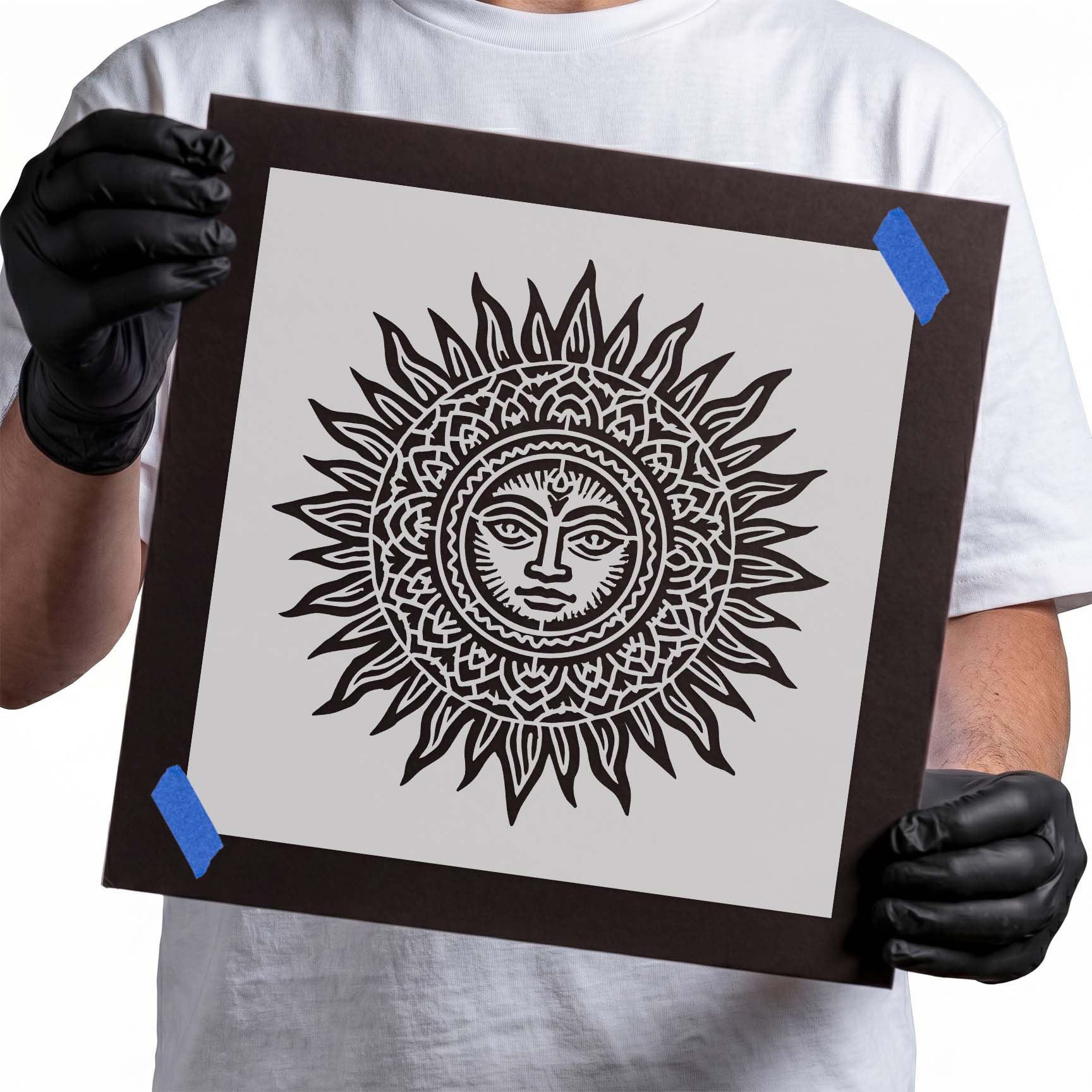 Intricate mandala sun stencil featuring a peaceful celestial face with radiant sun rays
