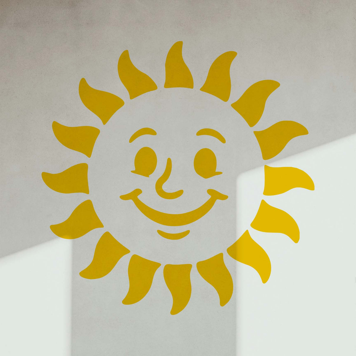 Bathed in soft light, the Cheerful Smiling Sun Face Stencil radiates sunny charm on a white wall.