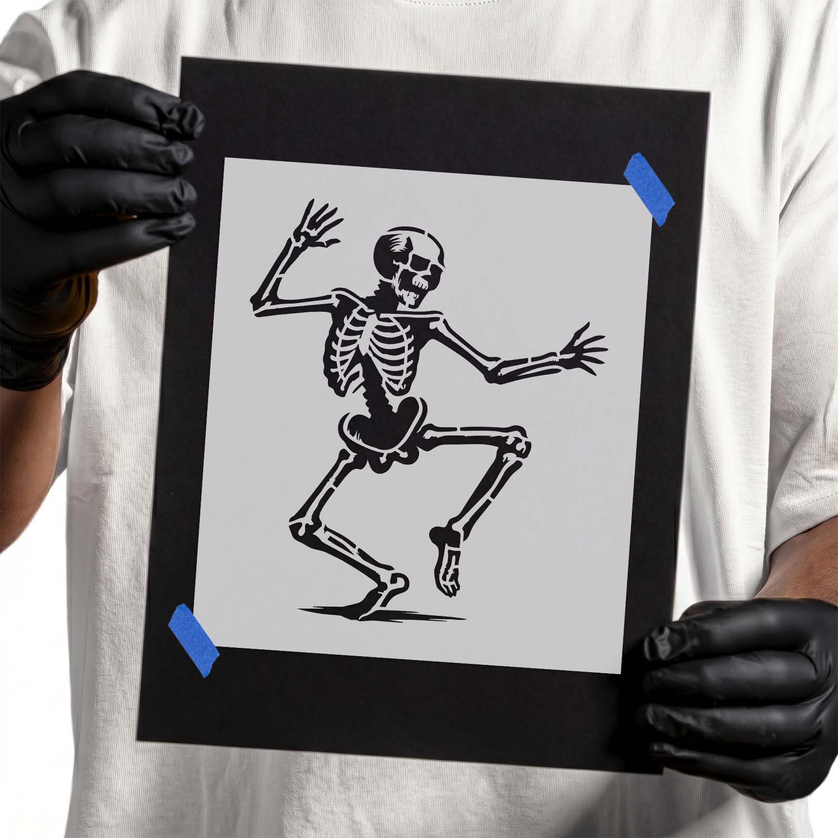 Dancing skeleton stencil in energetic pose with raised arms