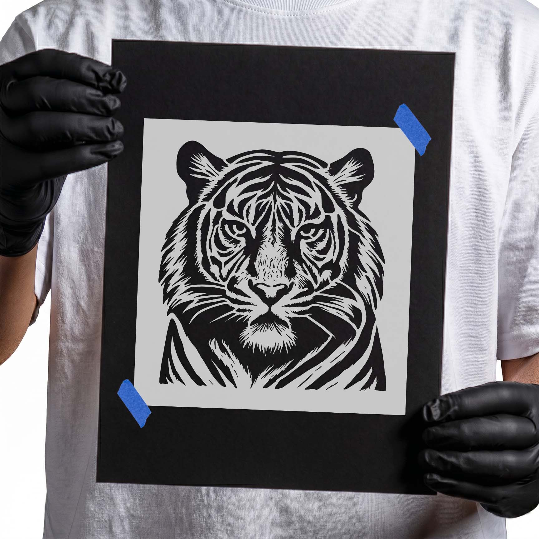 Detailed front-facing tiger face with bold striped markings stencil