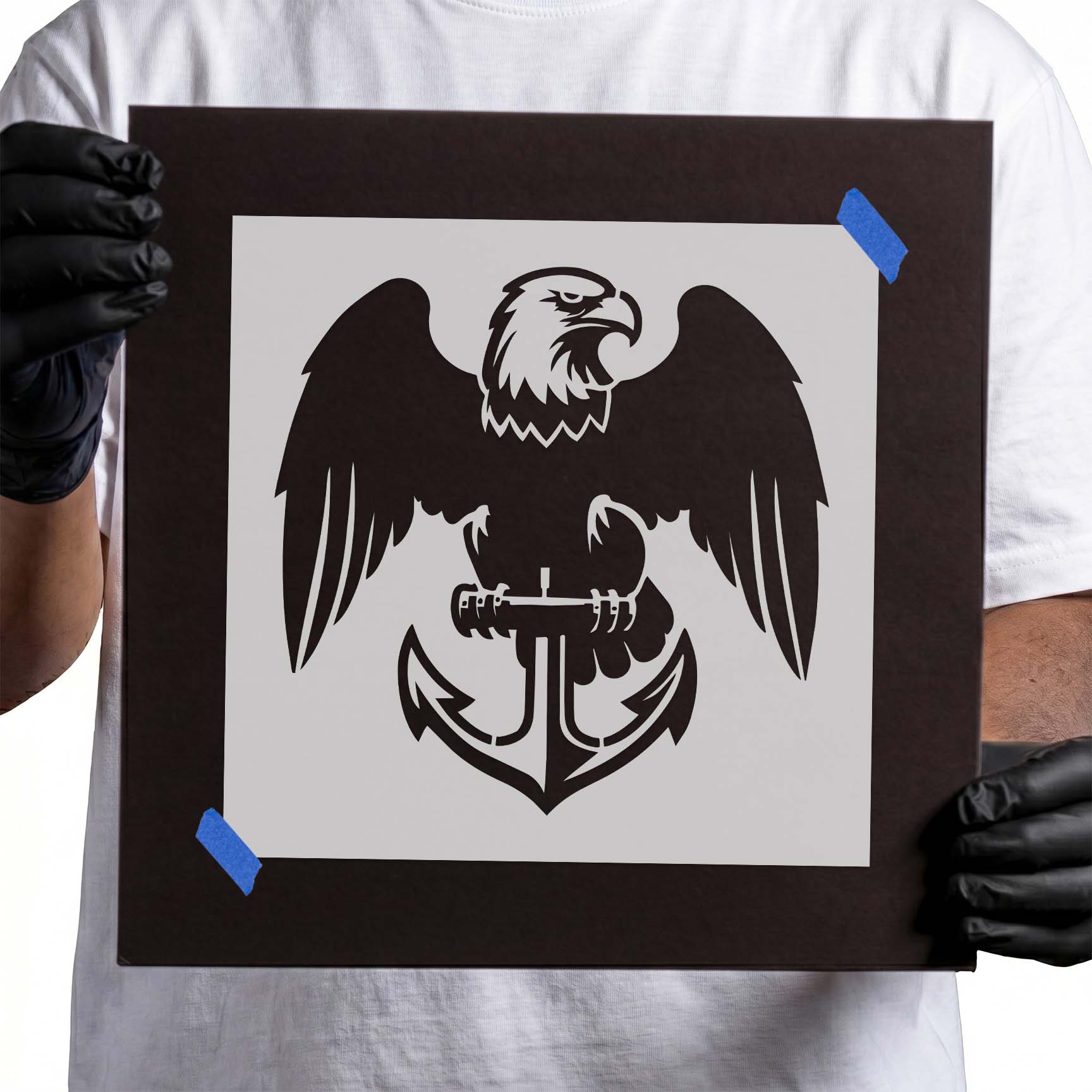 Bold eagle perched above a classic anchor emblem stencil for patriotic DIY crafts